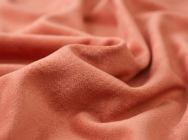 Peachskin soft-hand polyester fabric for bedding programs